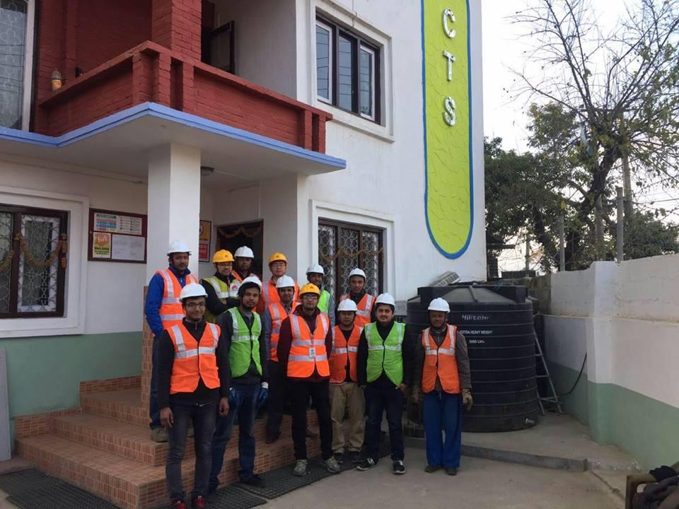 CTS field team in safety gear outside the CTS office
